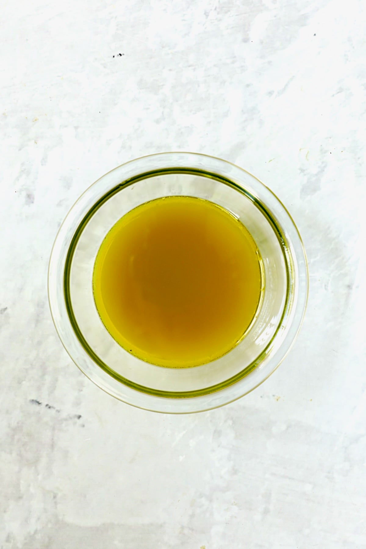Dressing for French Potato Salad in glass bowl.
