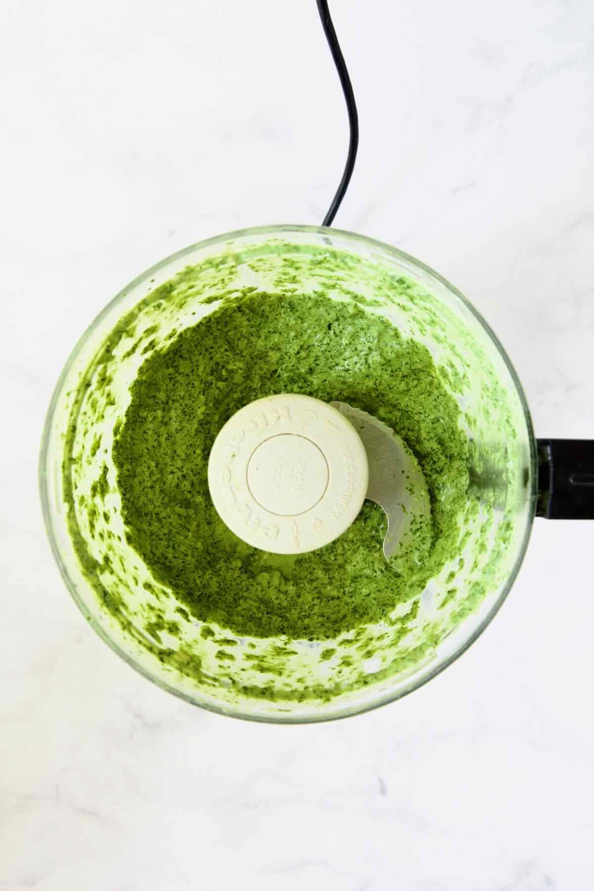 Cilantro Mint Chutney in food processor after being pureed.