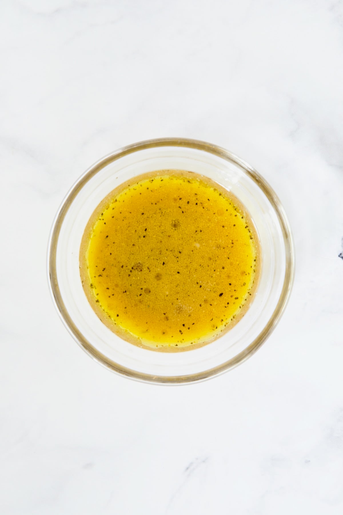 Vinaigrette in glass bowl.
