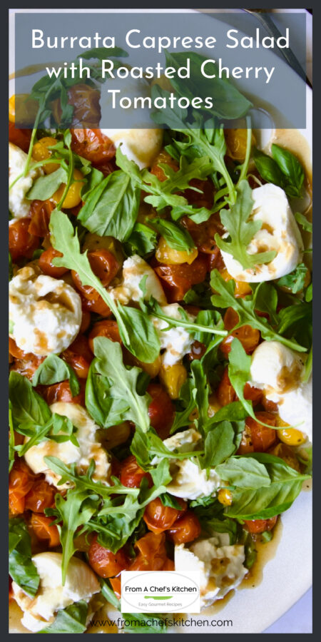 Roasted Cherry Tomato Burrata Caprese Salad on white oval platter.