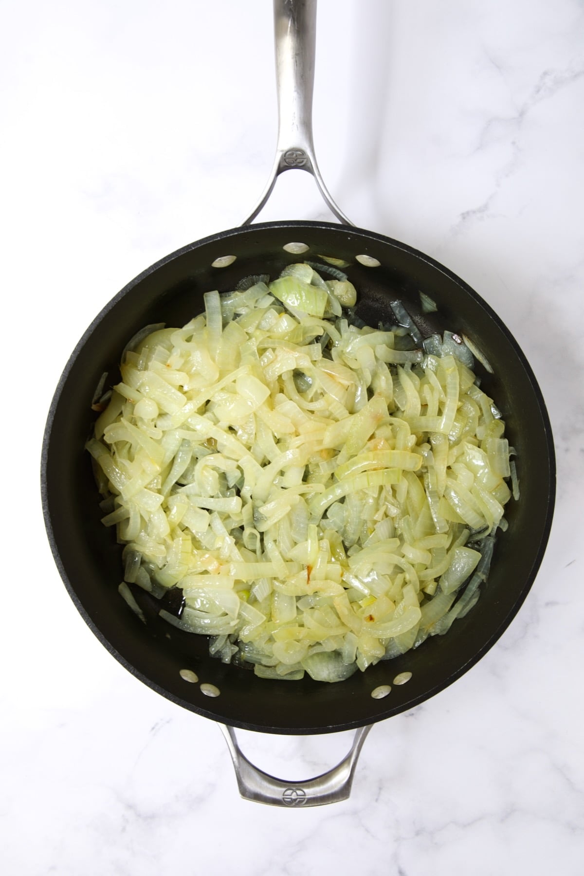 Cooked onions in nonstick skillet.