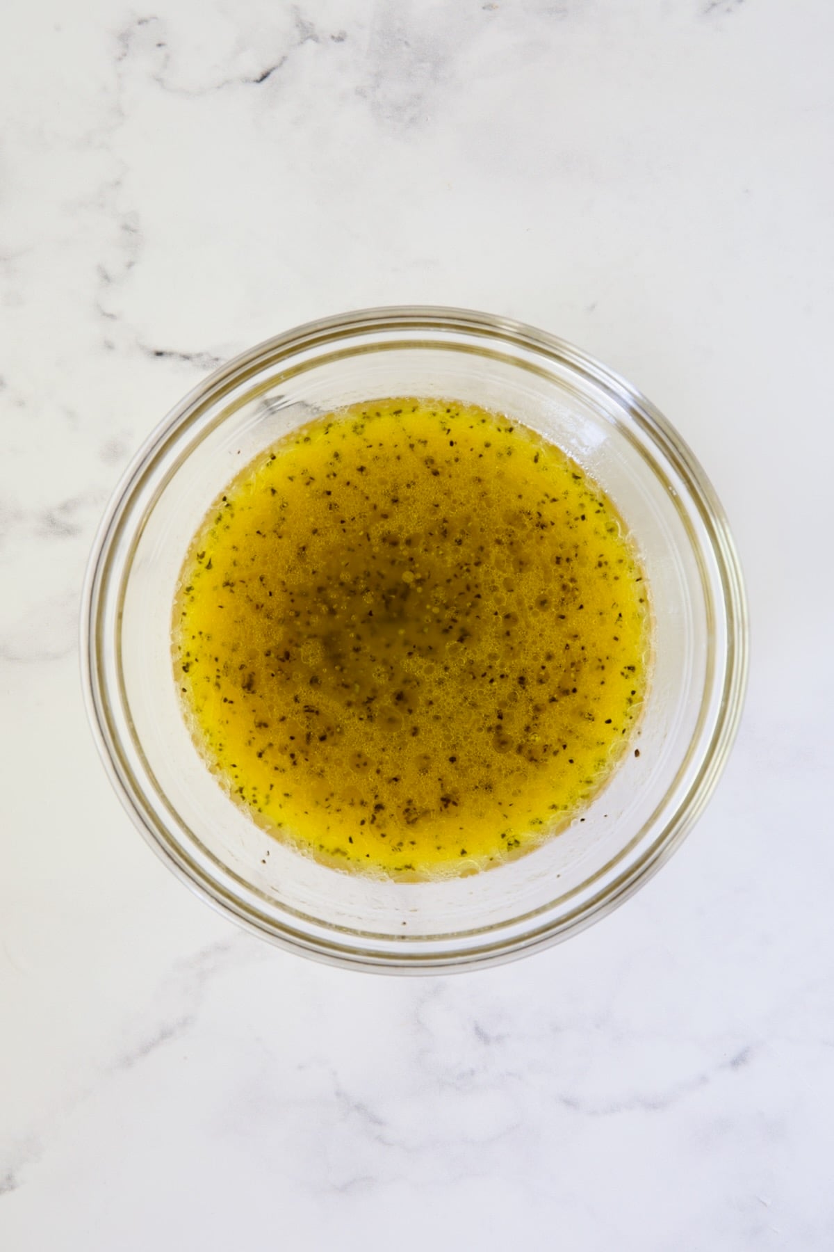 Vinaigrette in glass bowl.