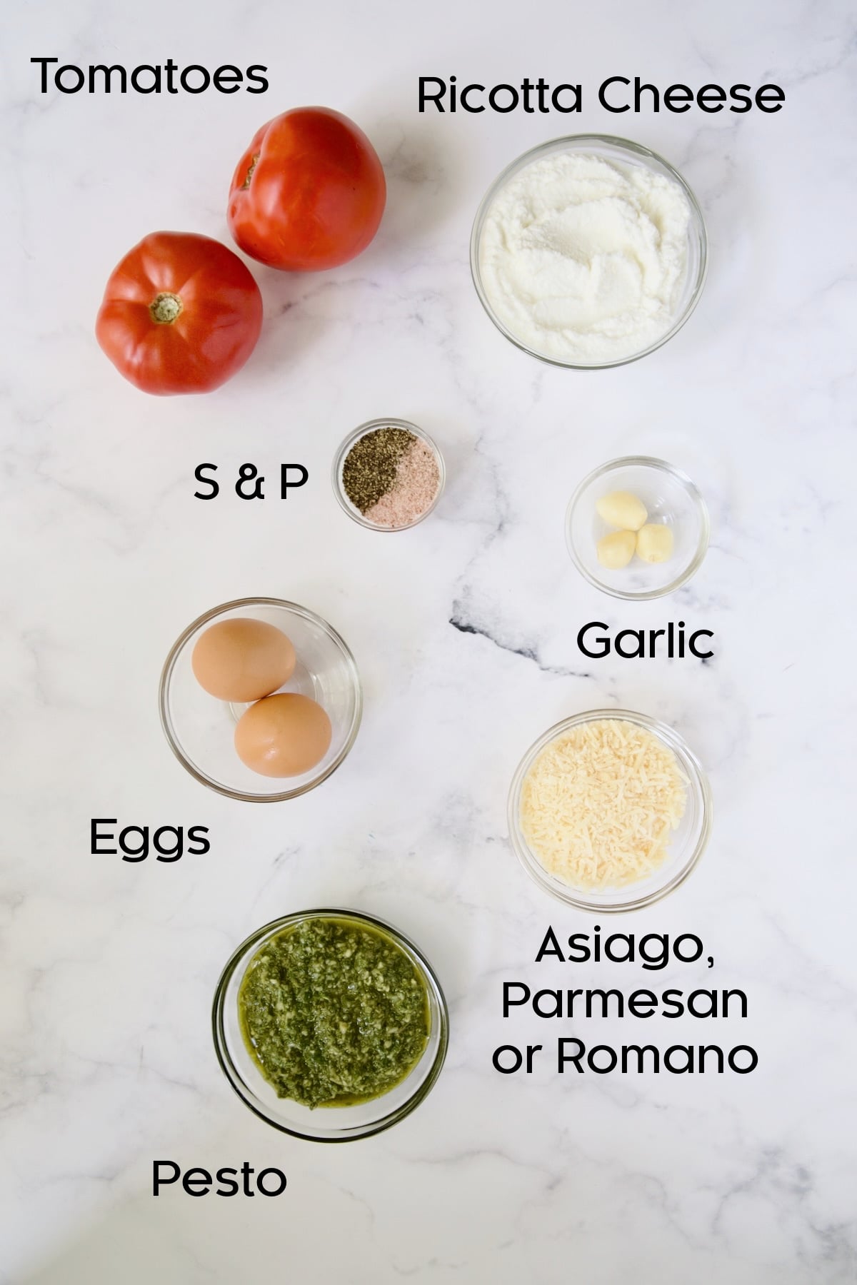 Ingredients for filling for Tomato Tart with Ricotta and Basil in glass bowls.