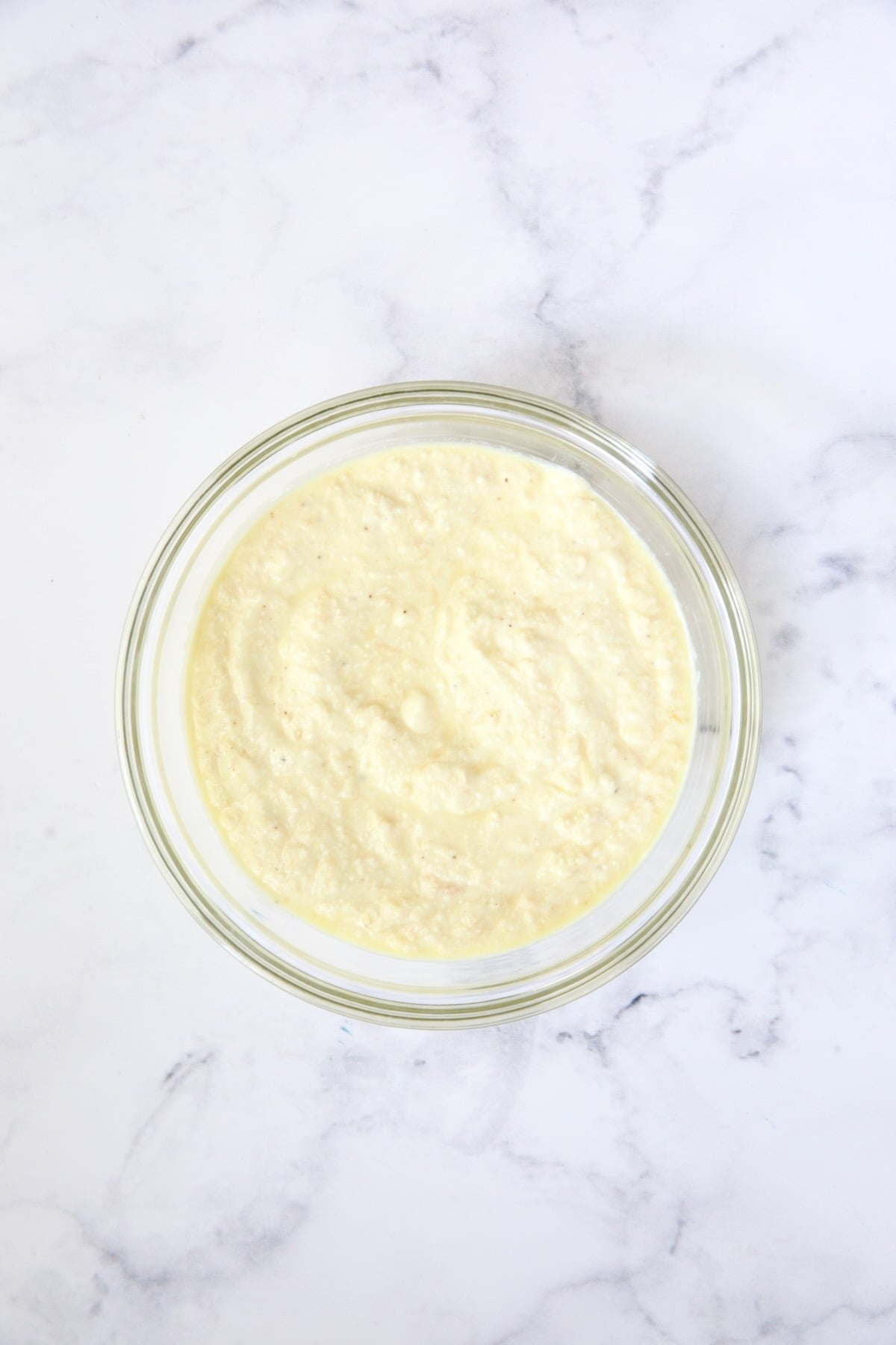 Ricotta custard in glass bowl.