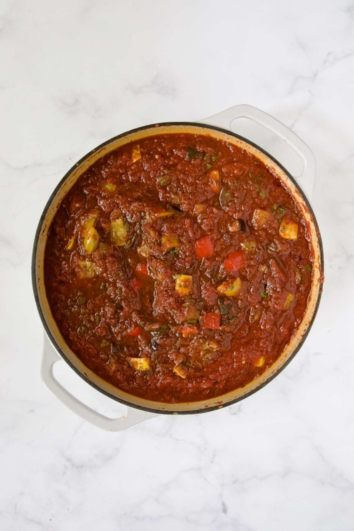 Finished Veggie Pasta Sauce in white enamel cast iron skillet.