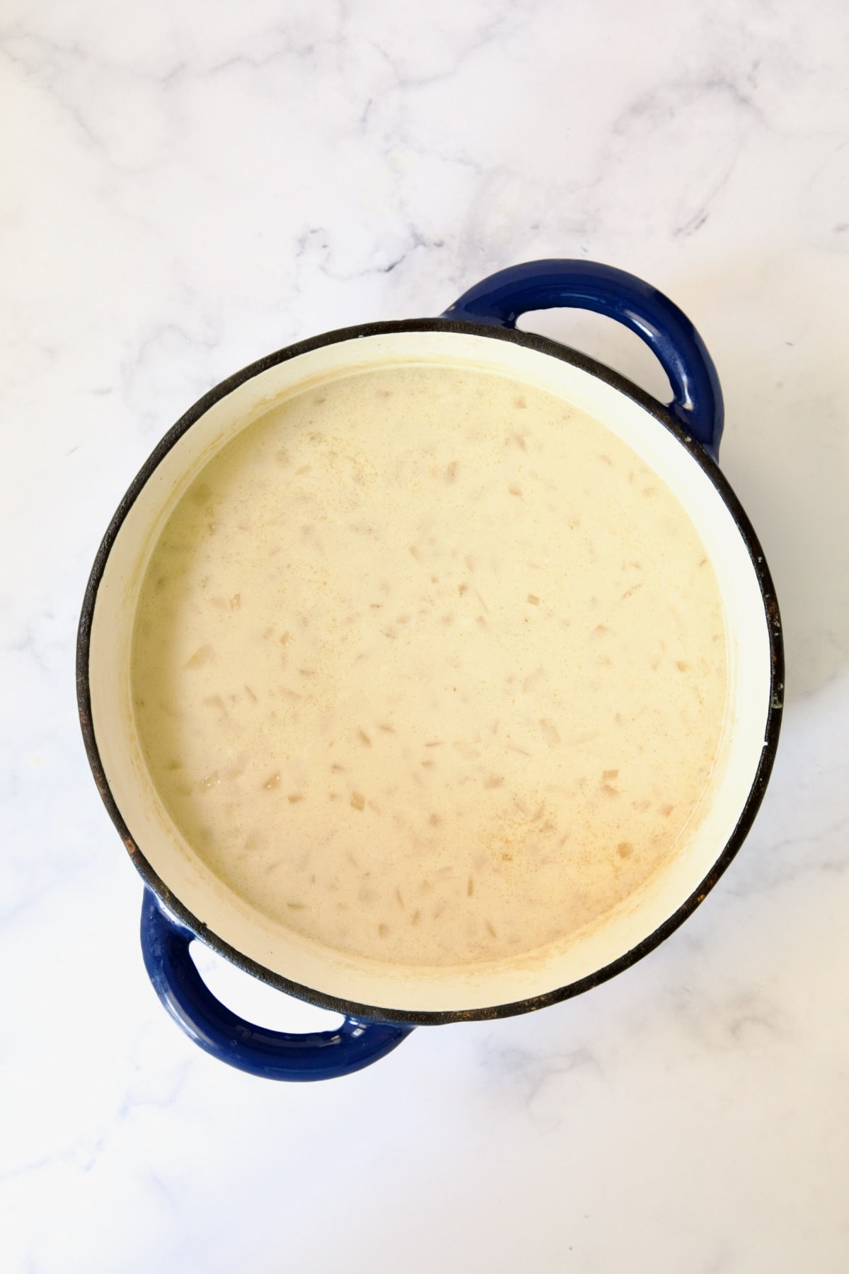 Cheddar Bacon Potato Soup with cream and thickener added.