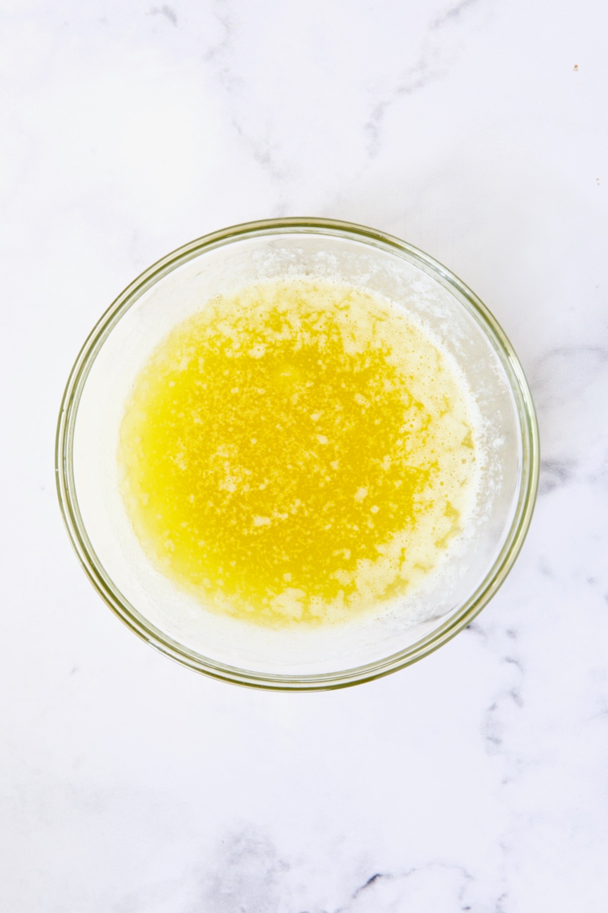 Melted butter in glass bowl.