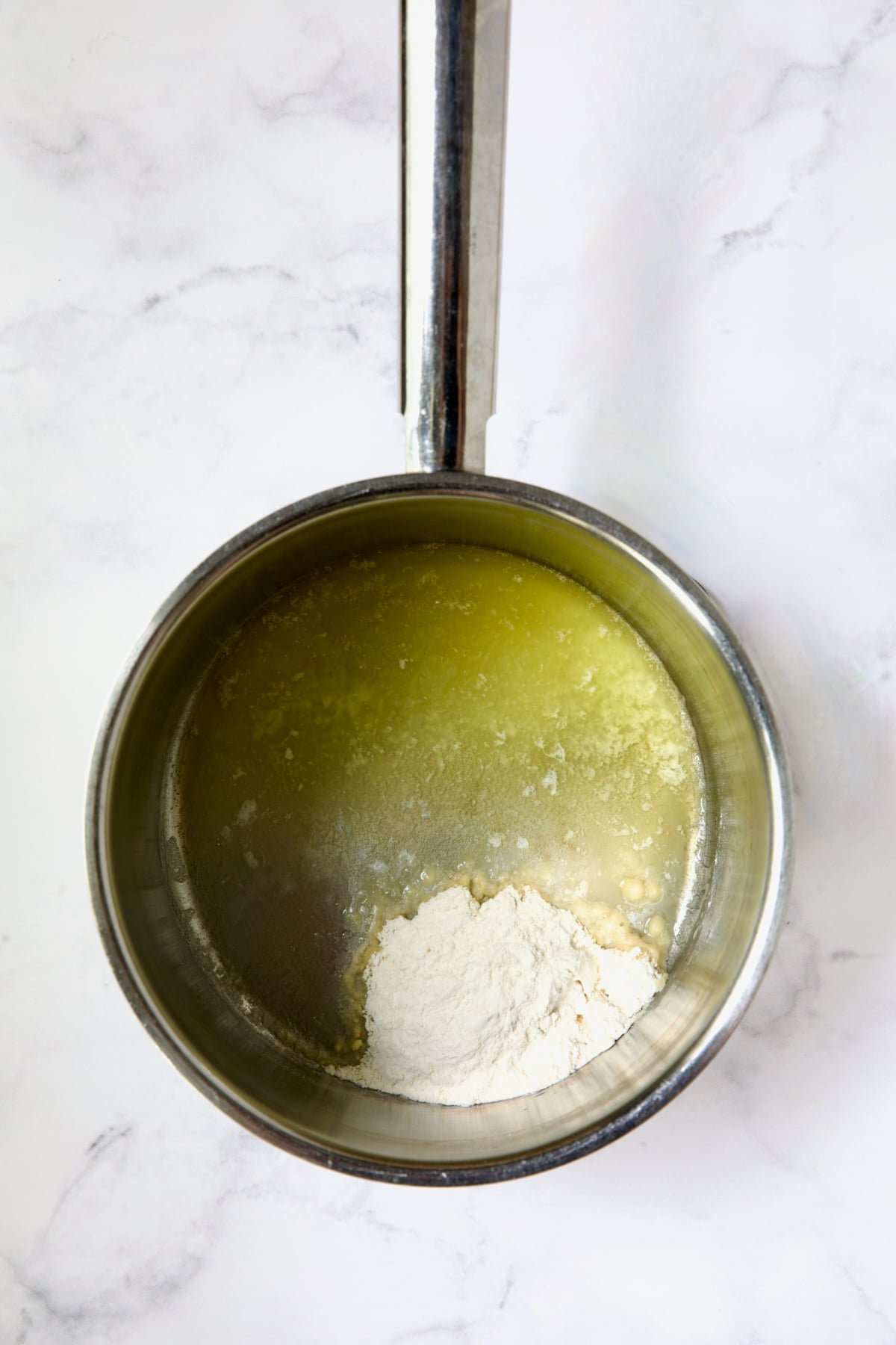 Melted butter and flour in stainless steel saucepan.