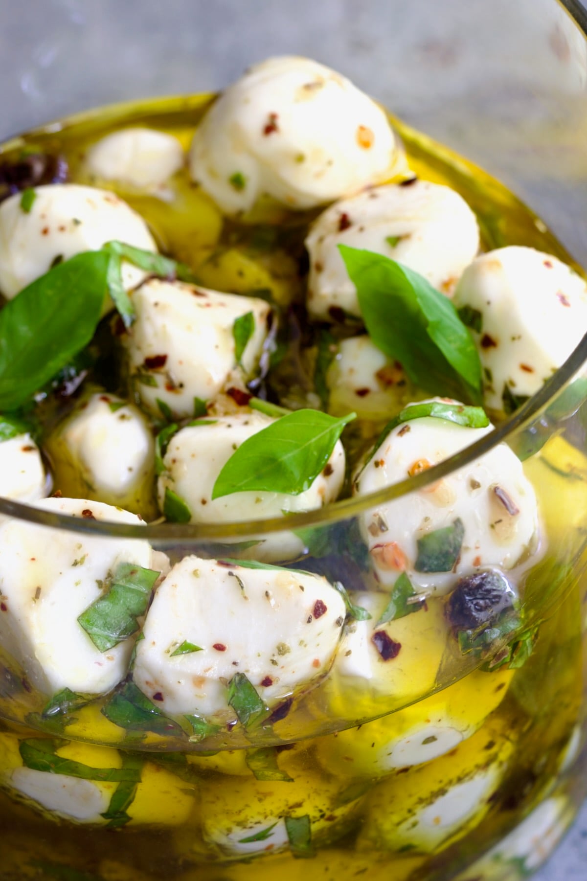 Marinated Mozzarella Balls in glass jar.