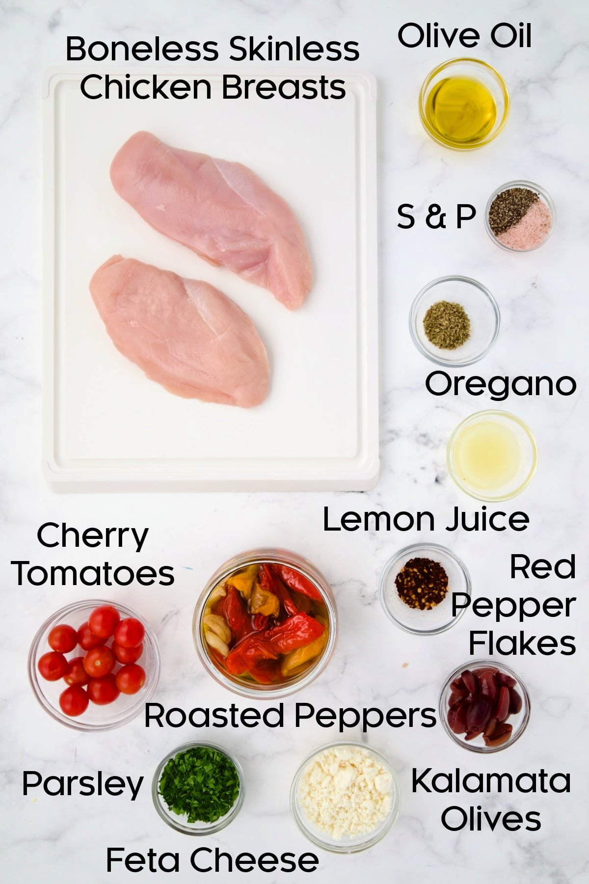 Ingredients for Baked Greek Chicken in glass bowls.