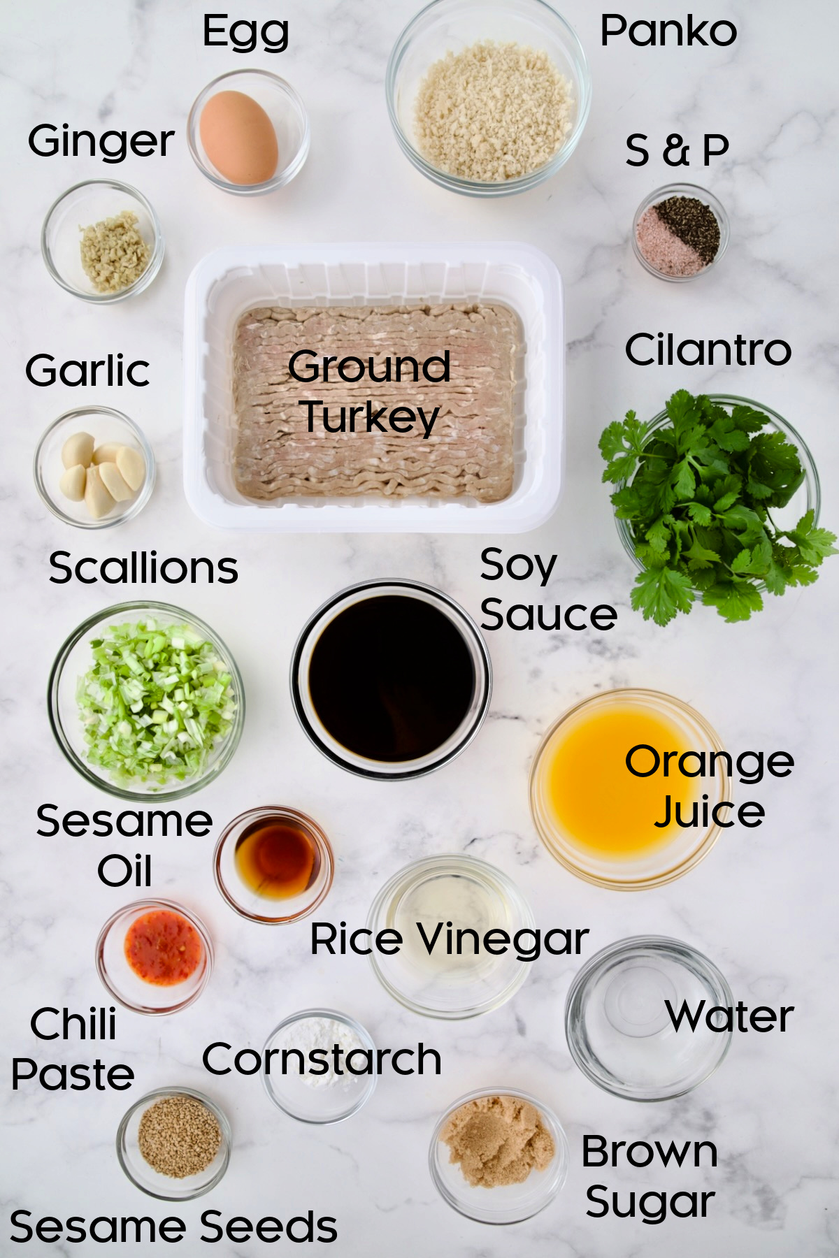 Ingredients for Asian Turkey Meatballs in glass bowls.