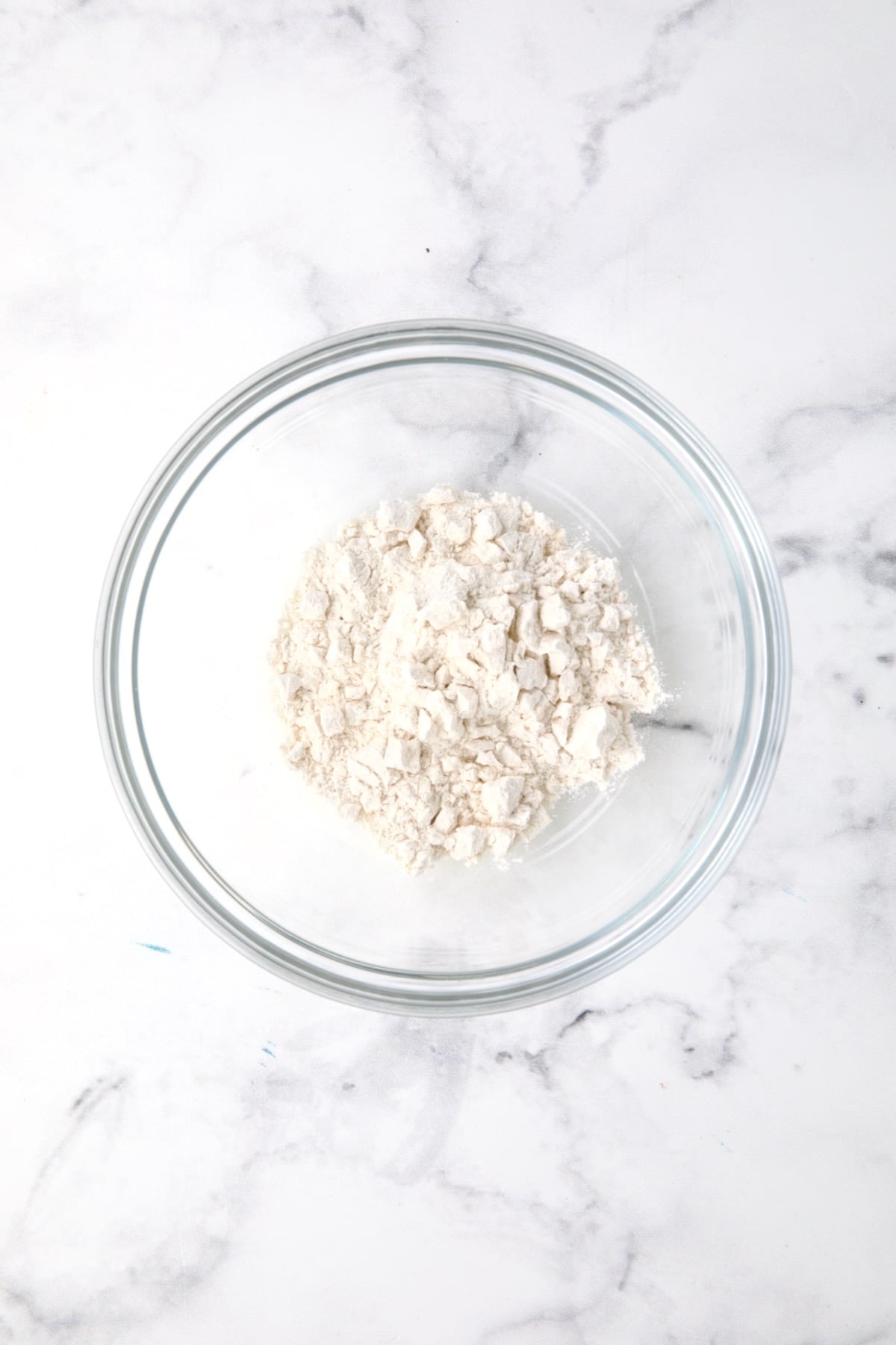 All-purpose flour in glass bowl.