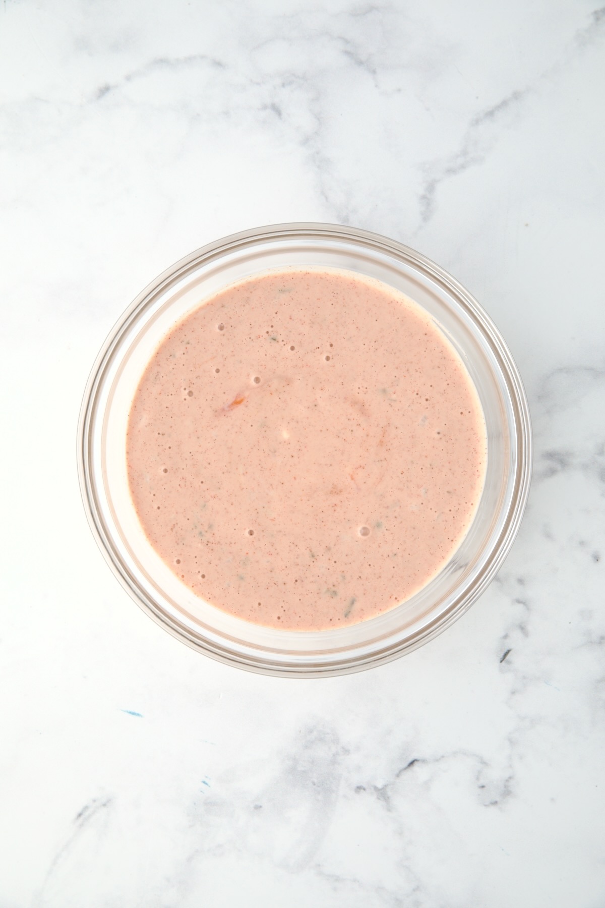 Thousand Island dressing in glass bowl.