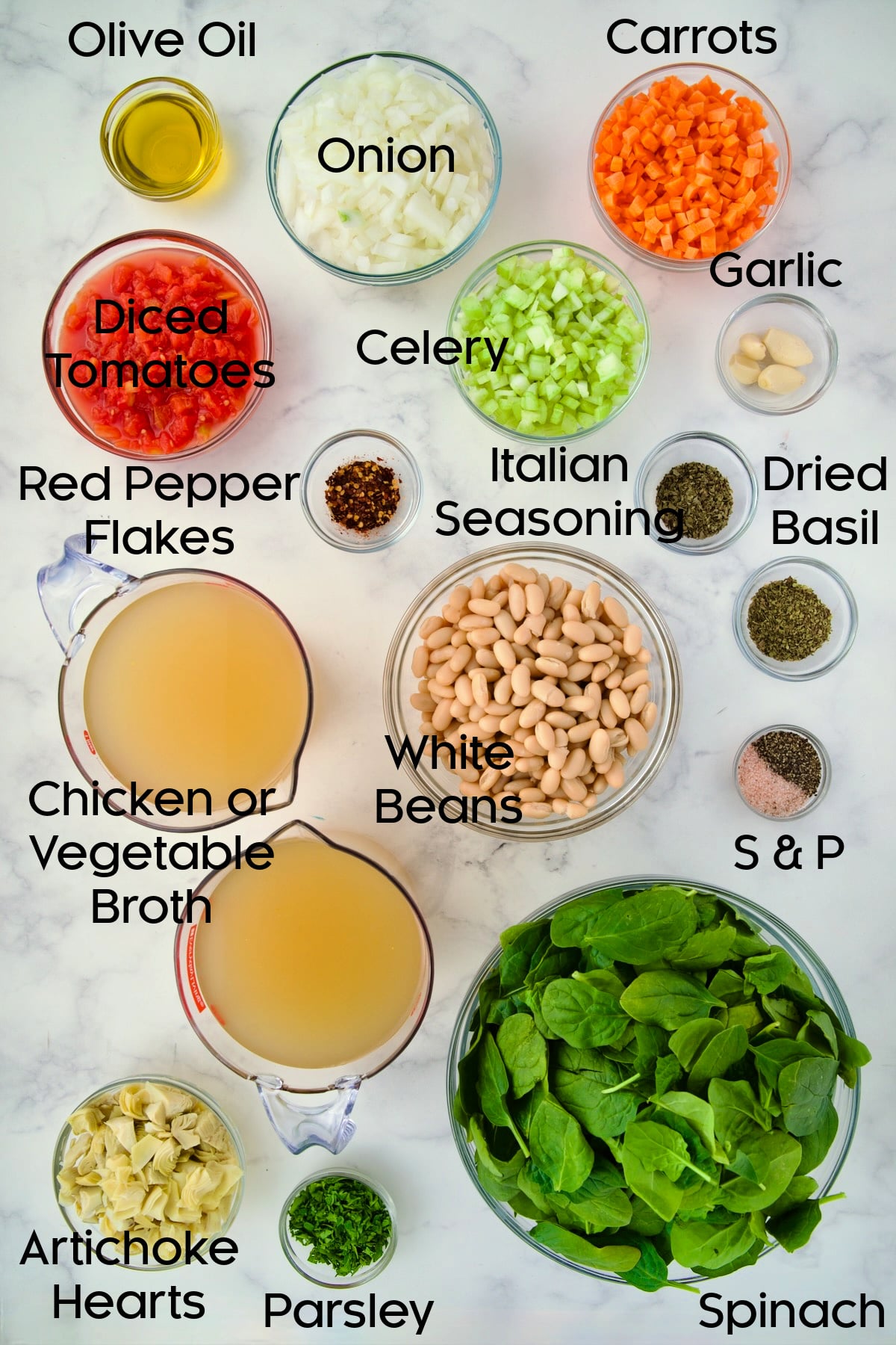 Ingredients for Vegetable Bean Soup in glass bowls.