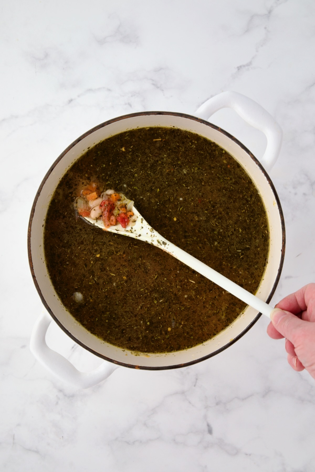 Vegetable Bean Soup with broth, beans and vegetables added.