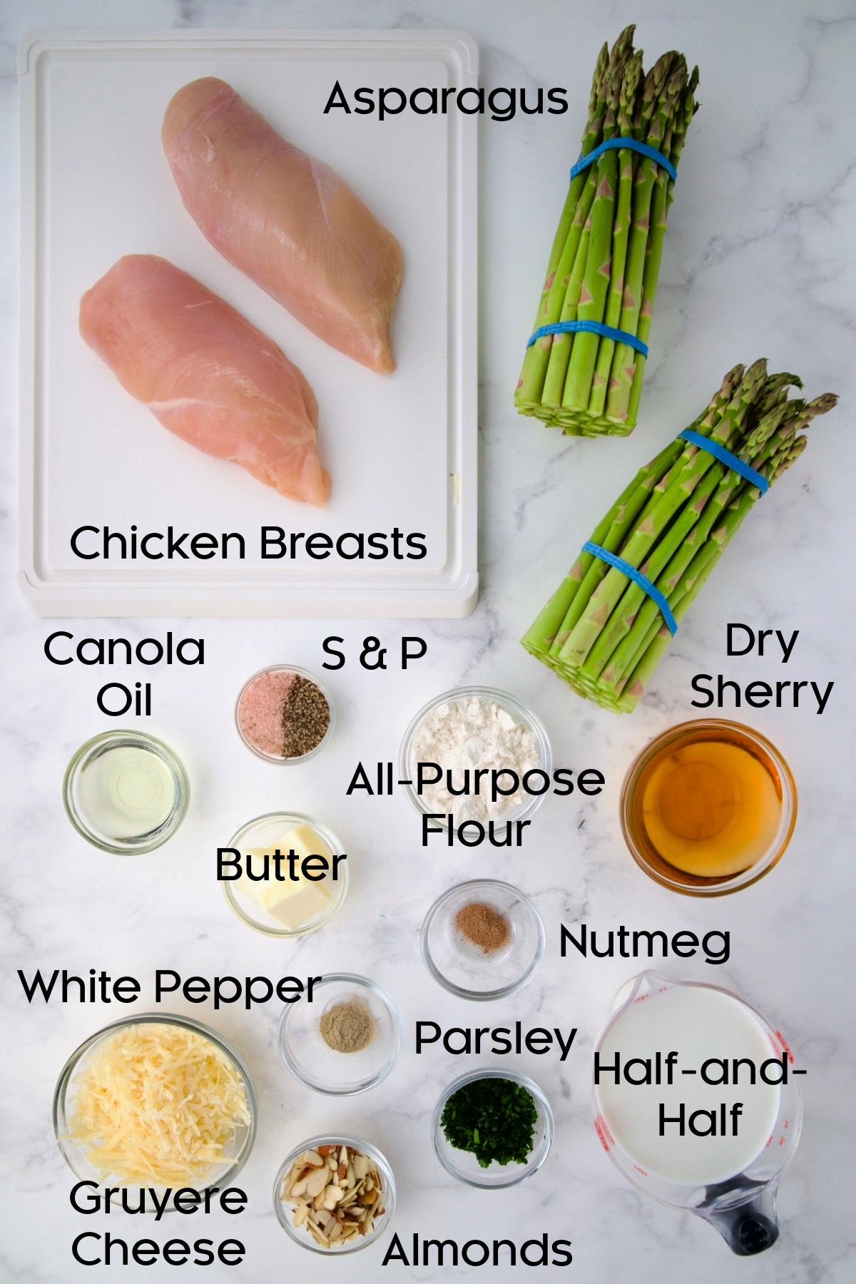 Ingredients for Chicken Divan with Asparagus in glass bowls.