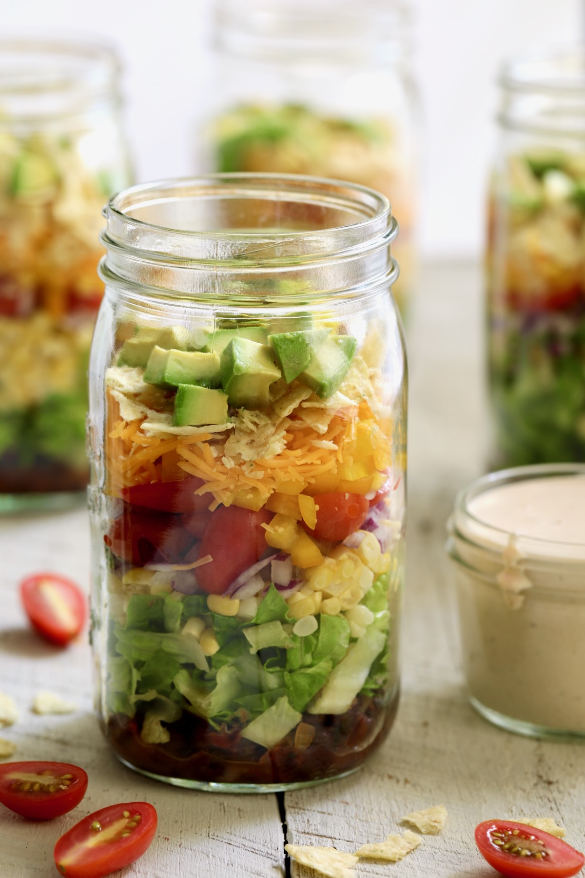 Southwestern Layered Salad in glass Mason jar.
