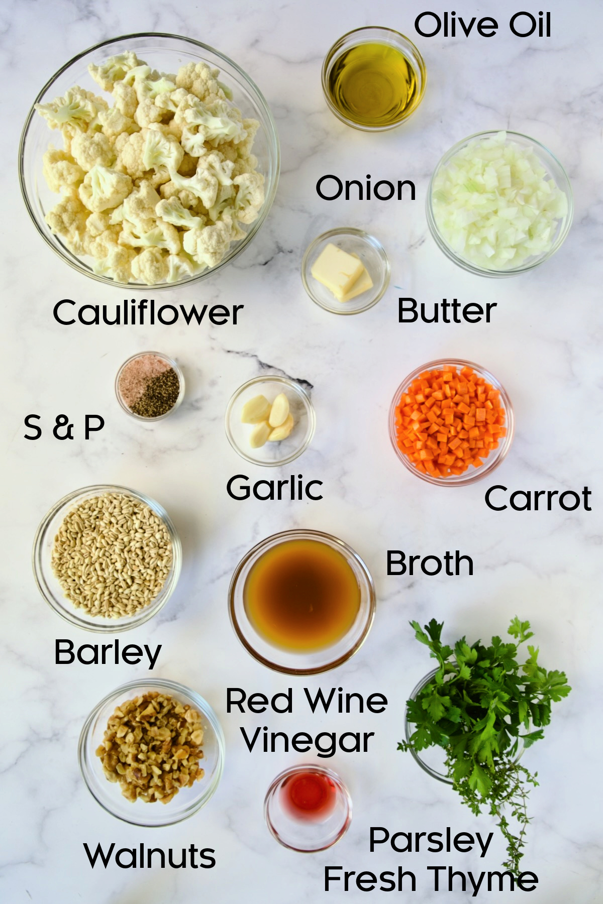 Ingredients for Barley Pilaf with Roasted Cauliflower in glass bowls.