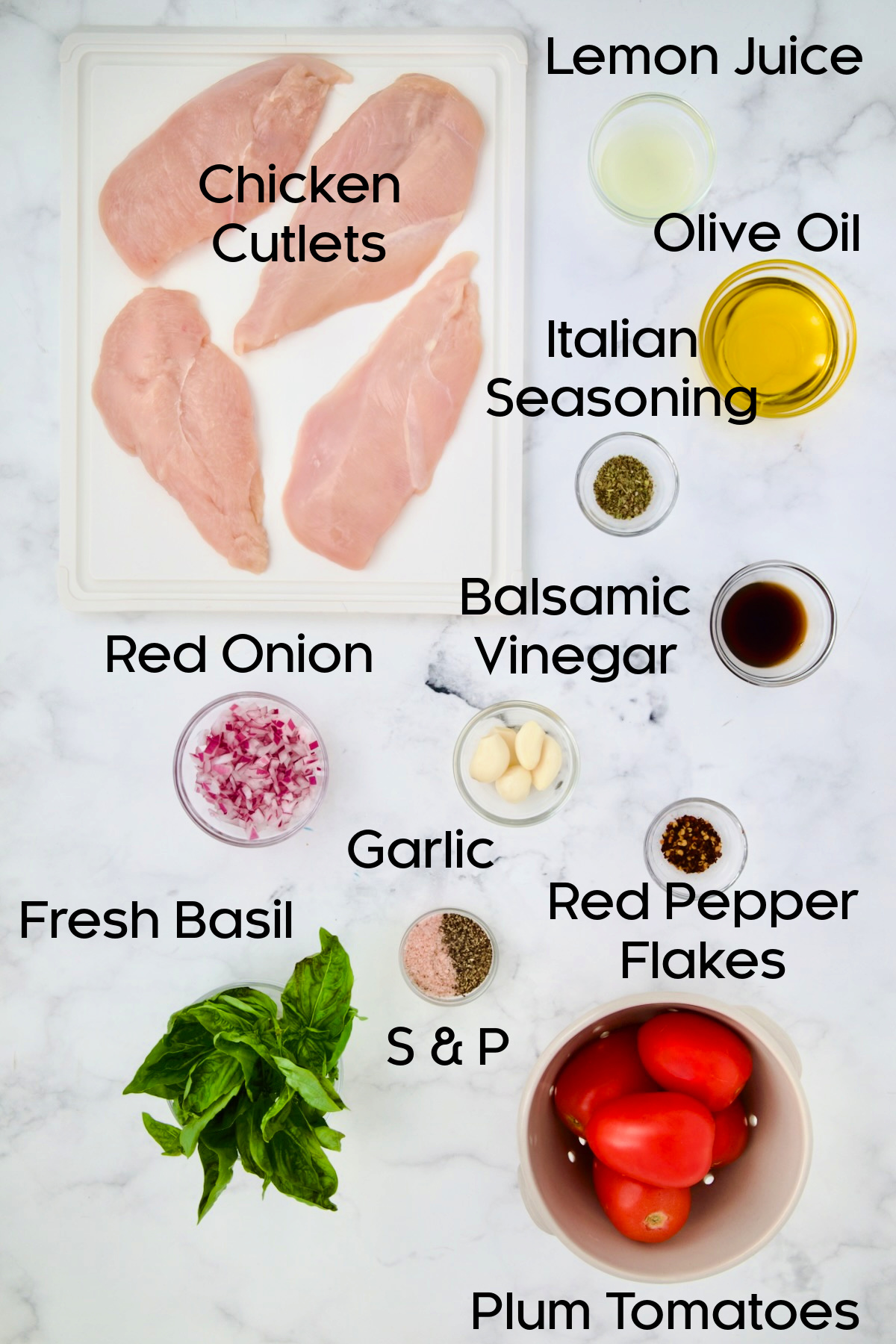 Ingredients for Chicken Bruschetta in glass bowls.