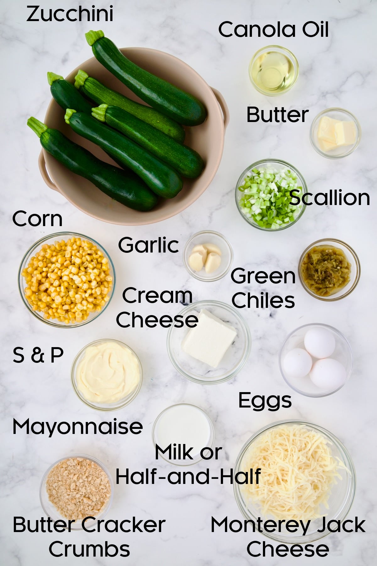Ingredients for Zucchini Corn Casserole in glass bowls.