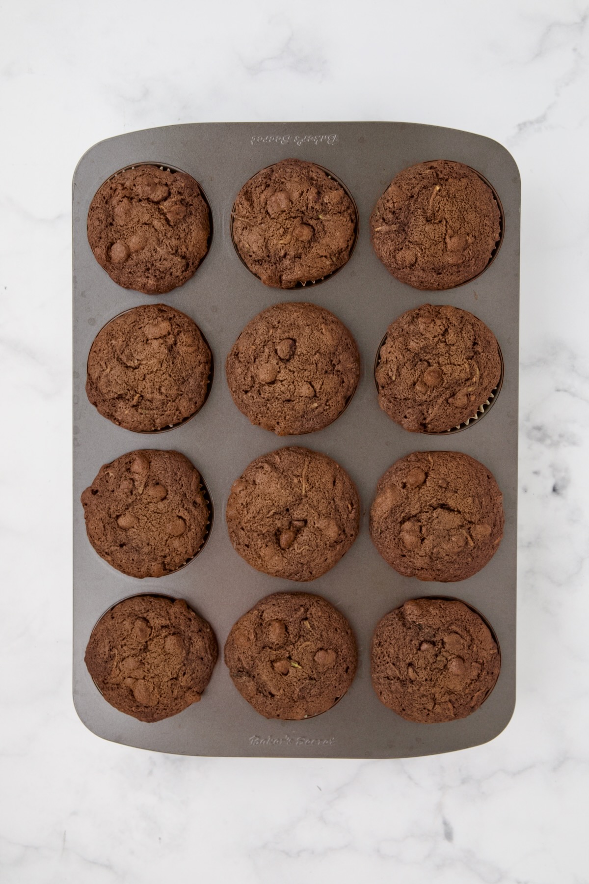 Baked muffins in 12-cup muffin pan.
