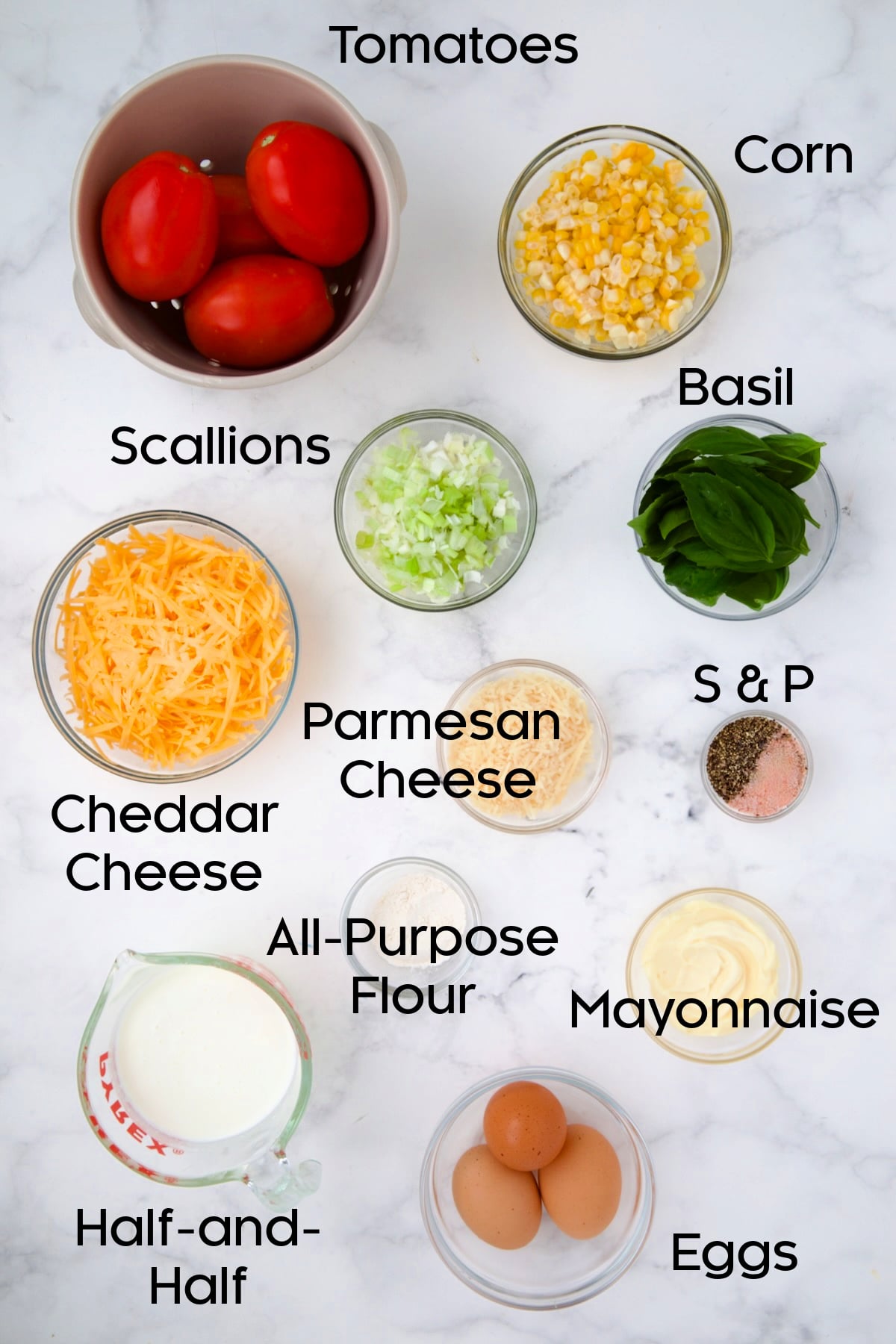 Ingredients for Tomato Pie Recipe with Corn and Basil in glass bowls.