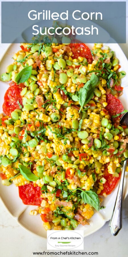 Pinterest graphic for Grilled Corn Succotash showing it on a white oval platter with serving spoon.