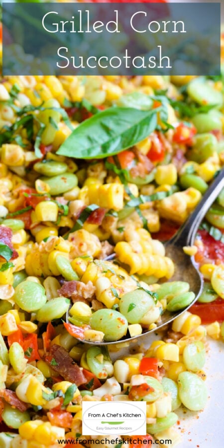 Pinterest graphic for Grilled Corn Succotash showing it on a white oval platter with serving spoon scooping some up.
