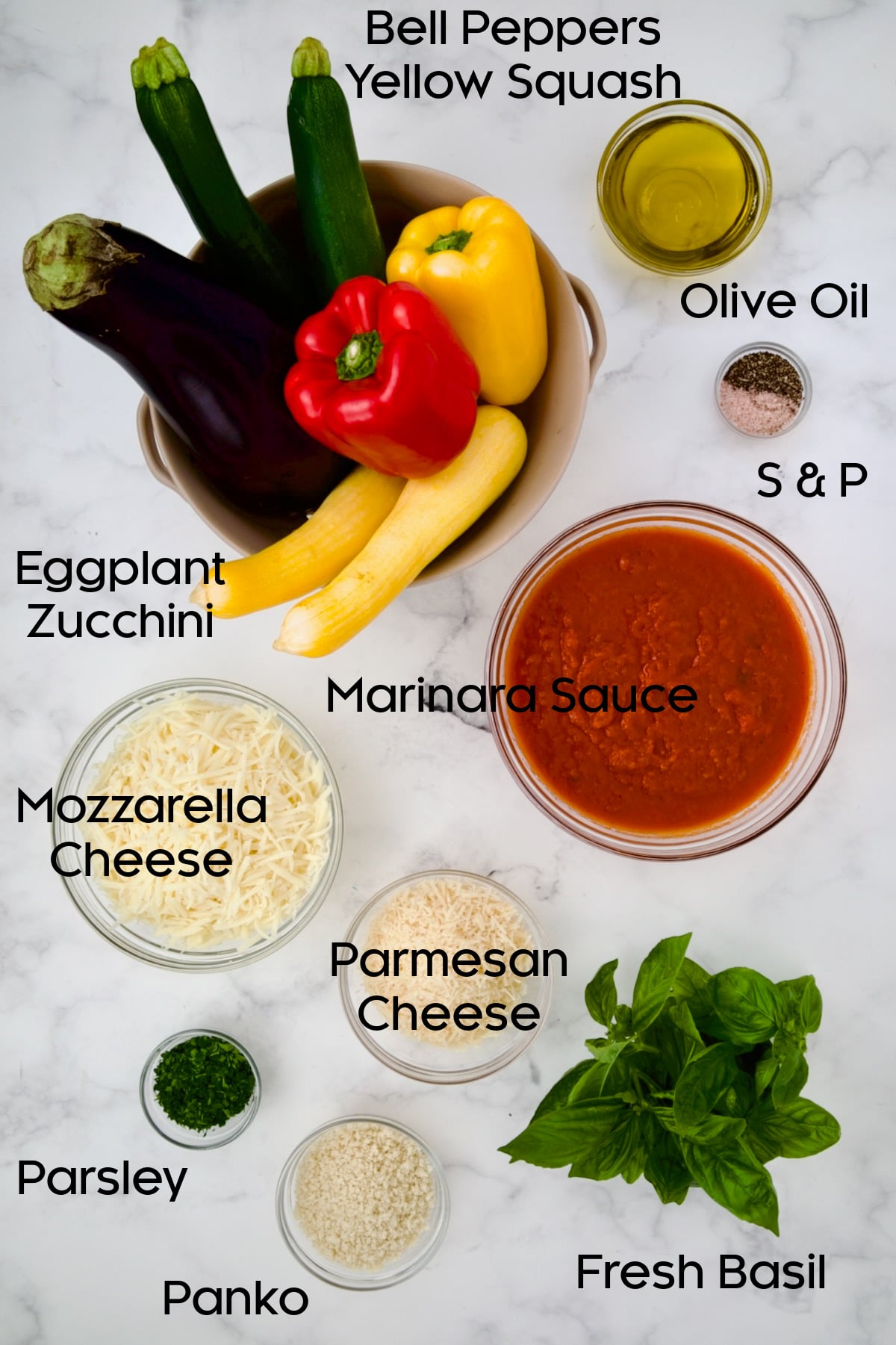 Ingredients for Summer Vegetable Parmigiana in glass bowls.