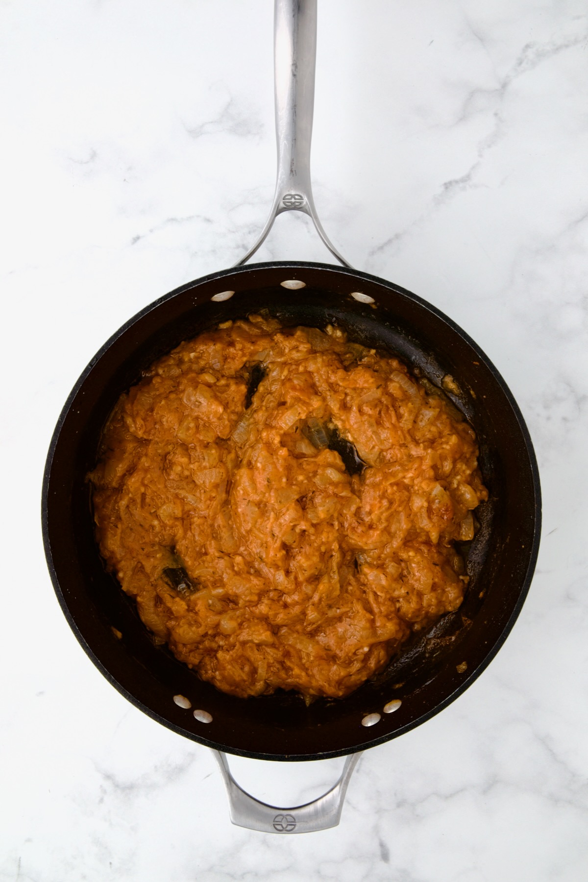 Onions, tomato paste and flour in nonstick skillet.