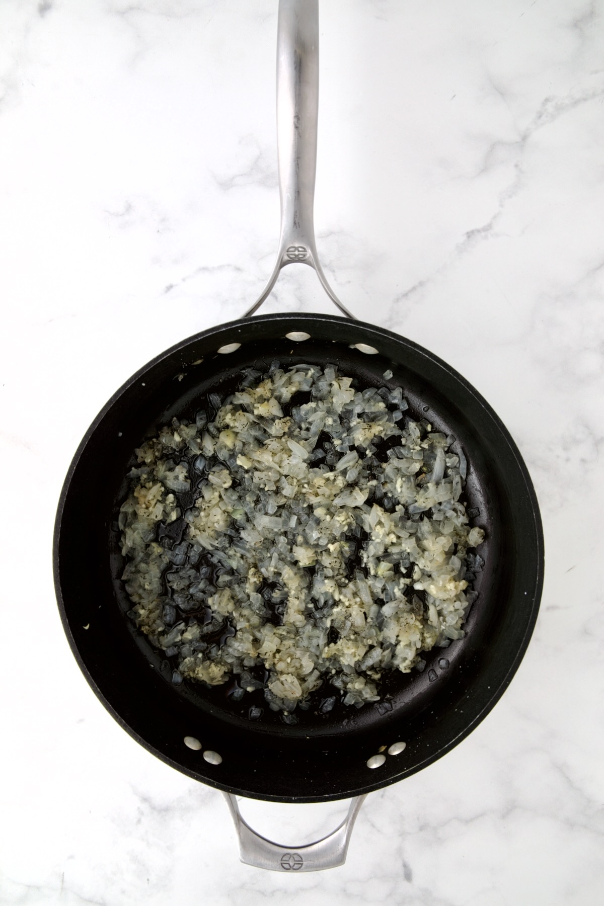 Cooked onions in nonstick skillet.