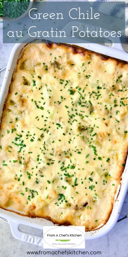 Pinterest graphic for Green Chile au Gratin Potatoes showing it in a white rectangular baking dish.