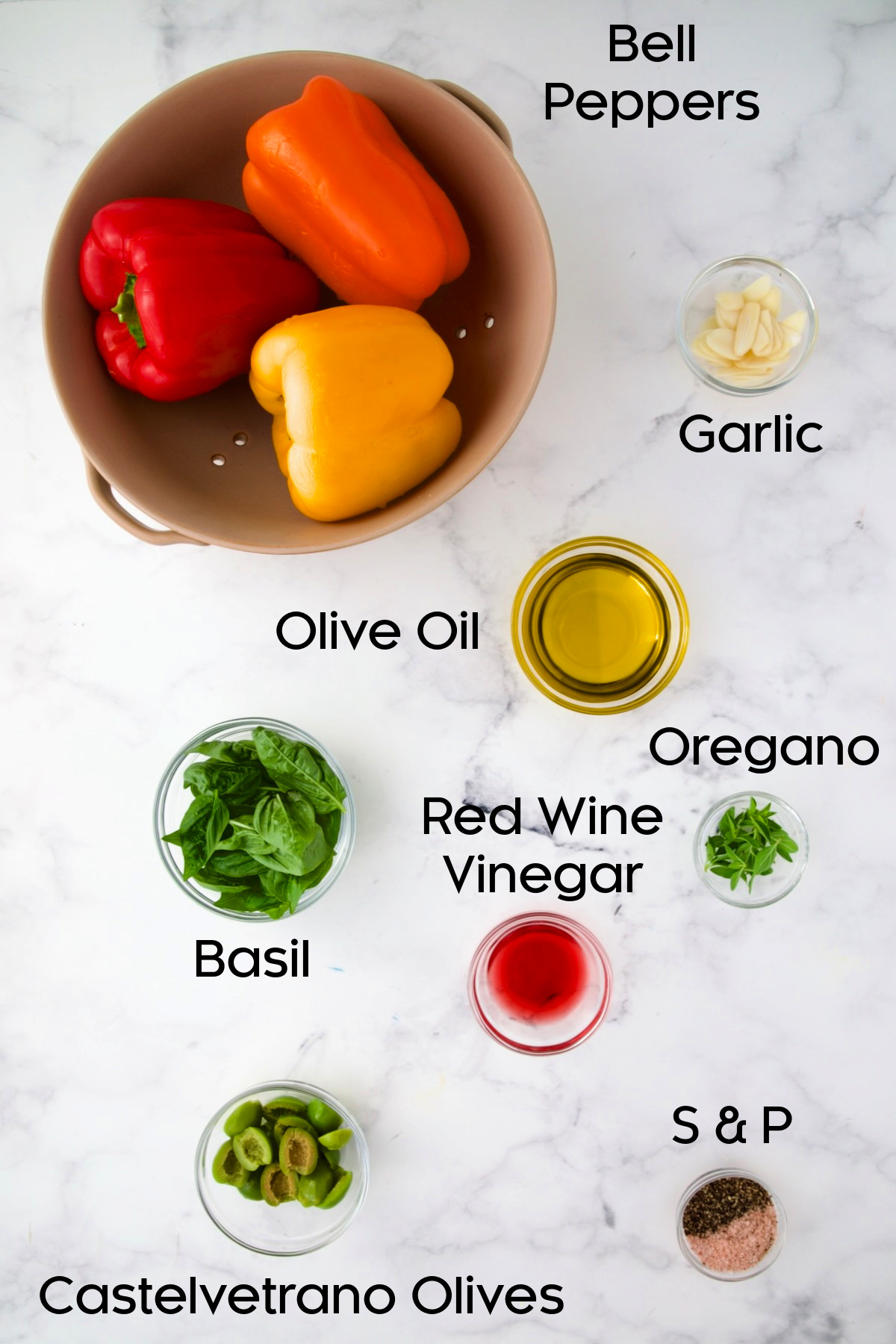 Ingredients for Roasted Pepper Salad in glass bowls.