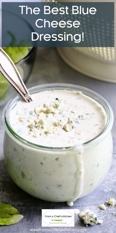 Pinterest graphic for Best Blue Cheese Dressing Recipe showing it in a glass jar with spoon.