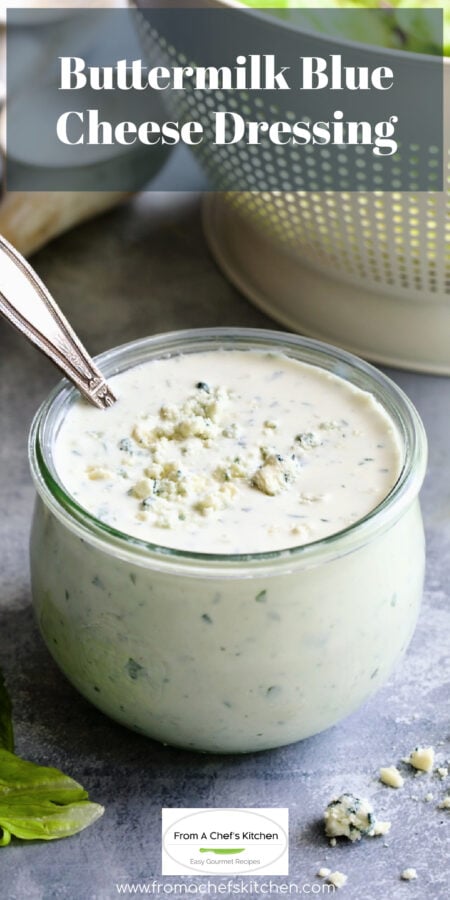Pinterest graphic for Best Blue Cheese Dressing Recipe showing it in a glass jar with spoon.