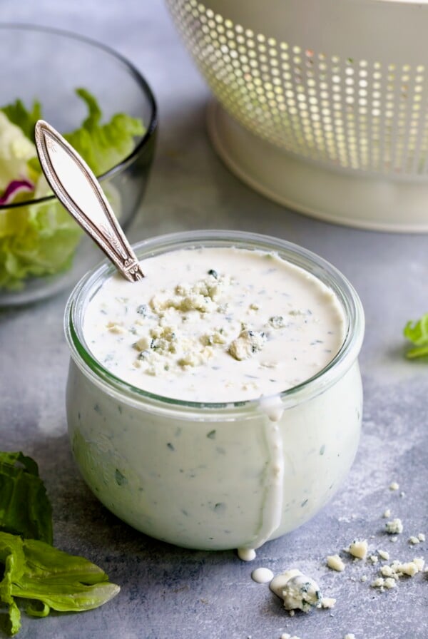 Best Blue Cheese Dressing Recipe in glass jar with spoon.