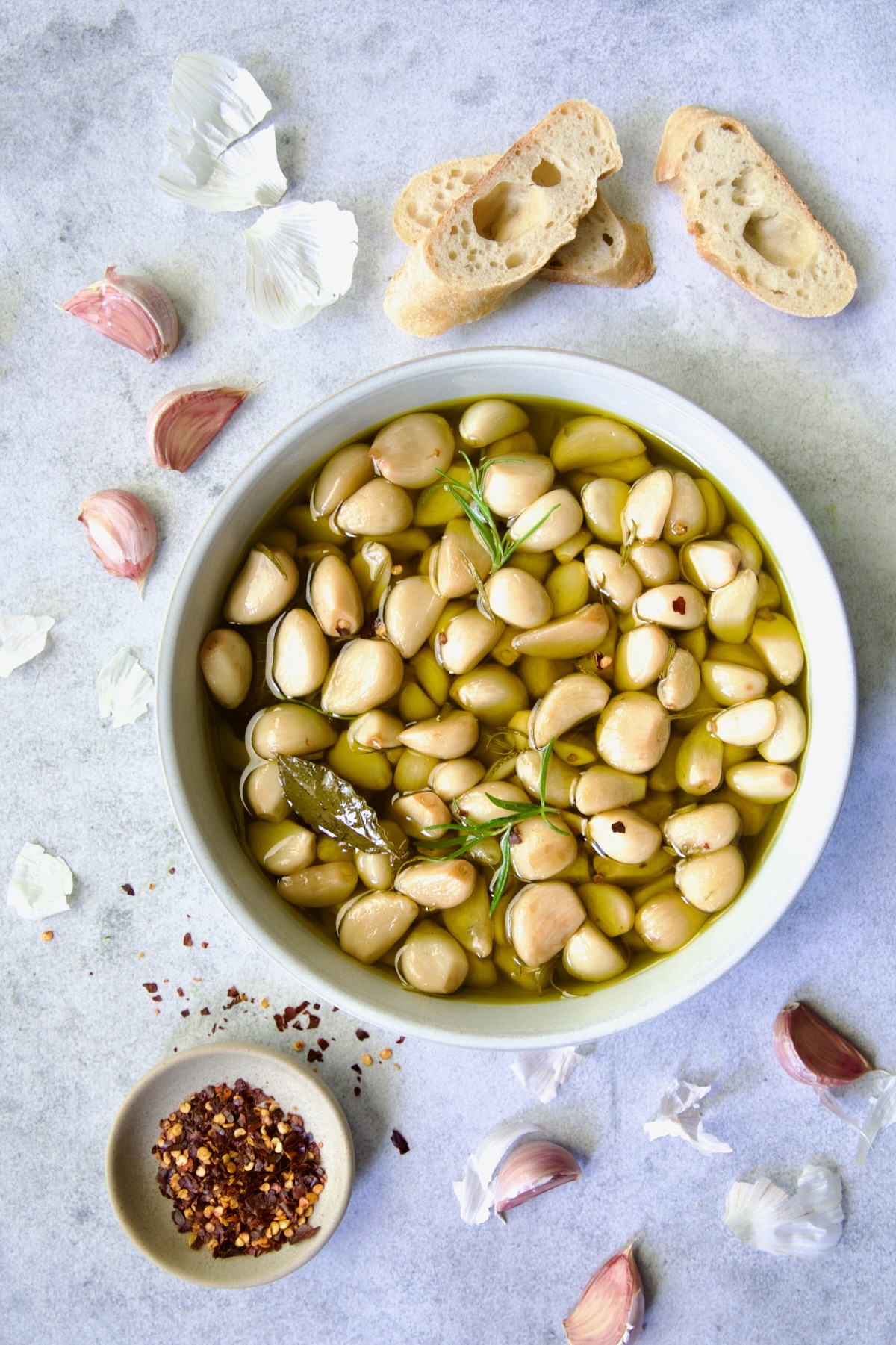 Garlic Confit in round earthenware bowl.