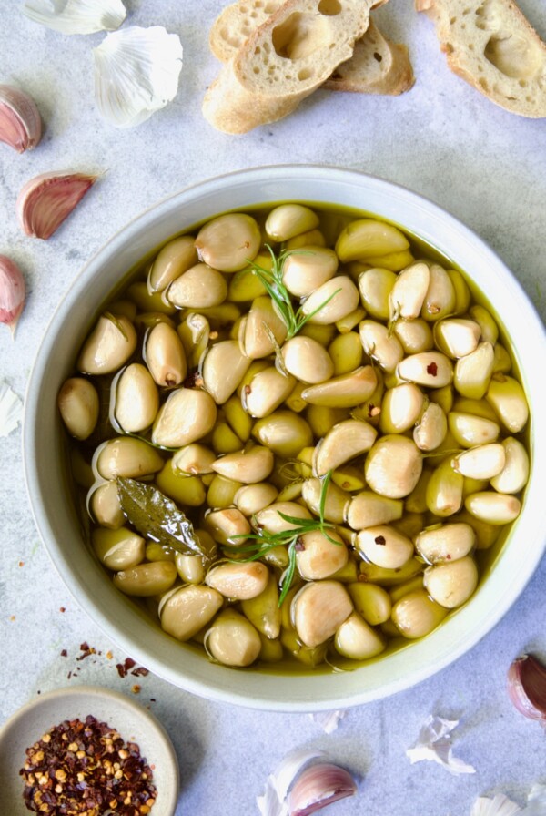 Garlic Confit in round earthenware bowl.