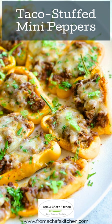 Pinterest graphic for Taco-Stuffed Mini Peppers showing them on a white oval platter.