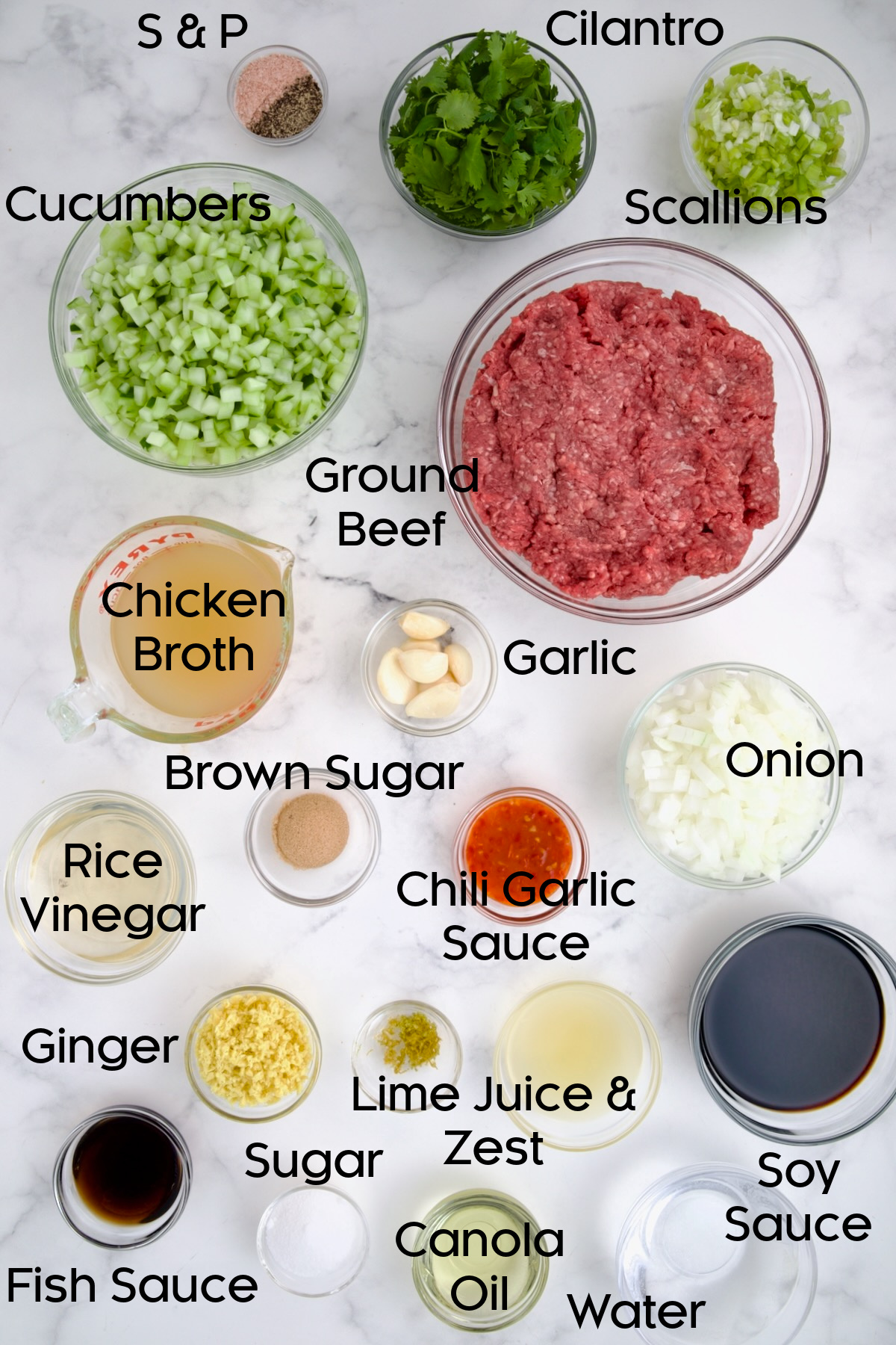 Ingredients for Vietnamese Beef Lettuce Wraps in glass bowls.