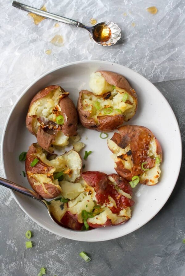 Five Salt and Vinegar Smashed Potatoes in white serving bowl.