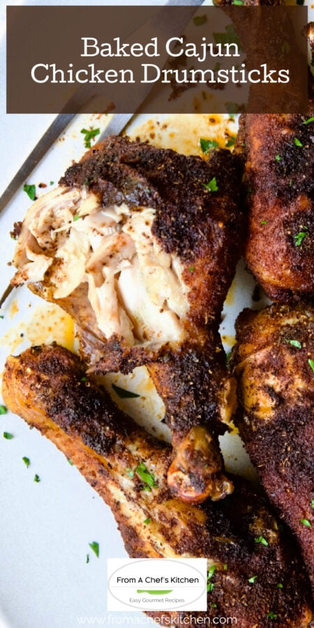 Pinterest graphic for Baked Cajun Chicken Drumsticks showing them on a white platter.