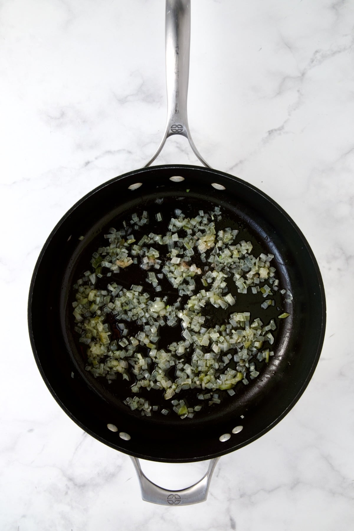 Cooked shallots in nonstick skillet.