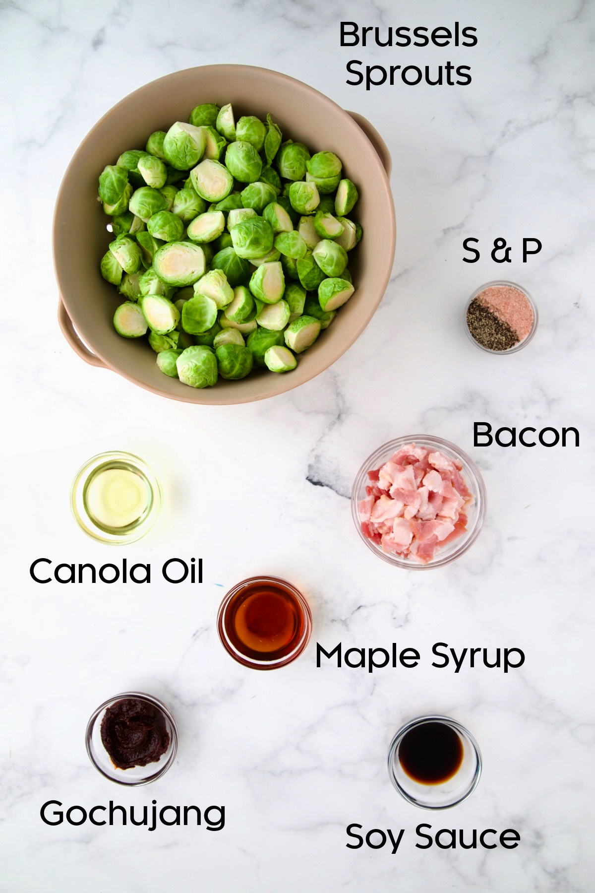 Ingredients for Maple Bacon Gochujang Brussels Sprouts in glass bowls.