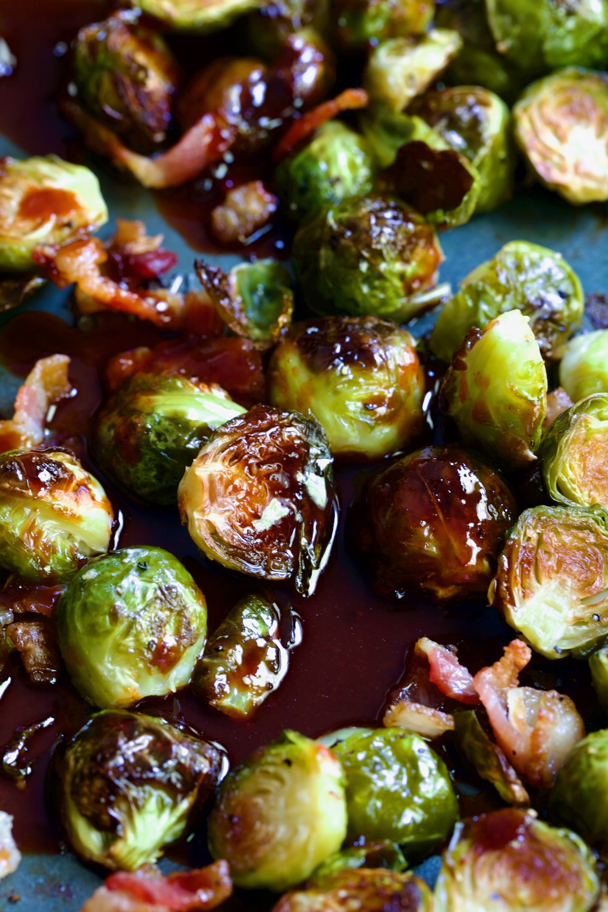 Glaze on Brussels sprouts on sheet pan.