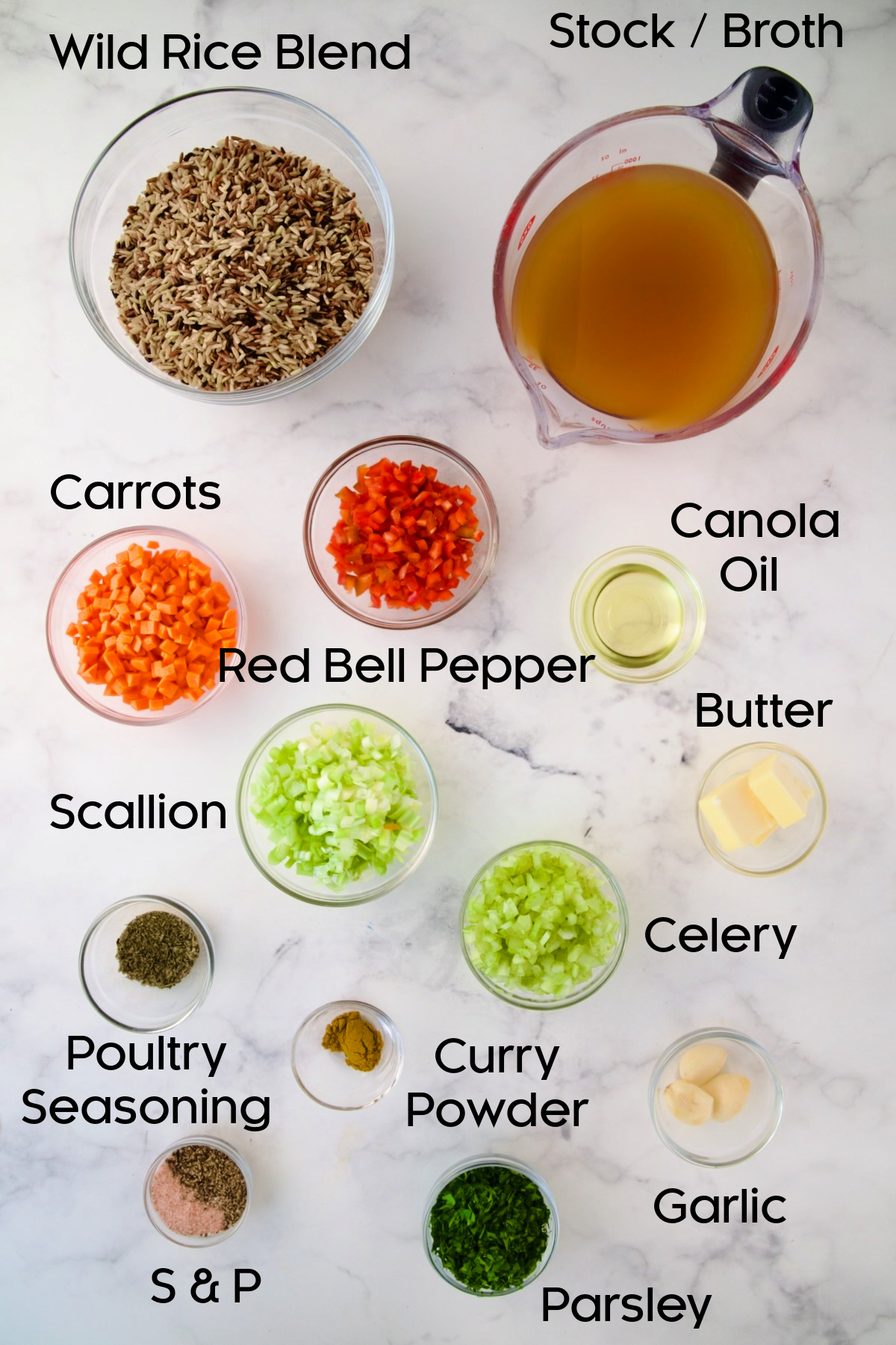 Ingredients for Wild Rice Pilaf in glass bowls.