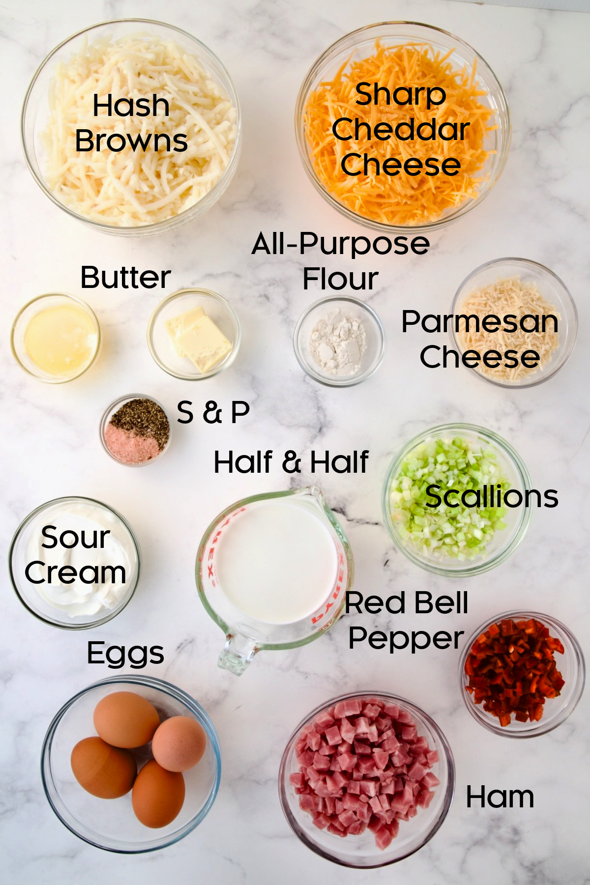 Ingredients for Quiche with Hash Brown Potato Crust in glass bowls.