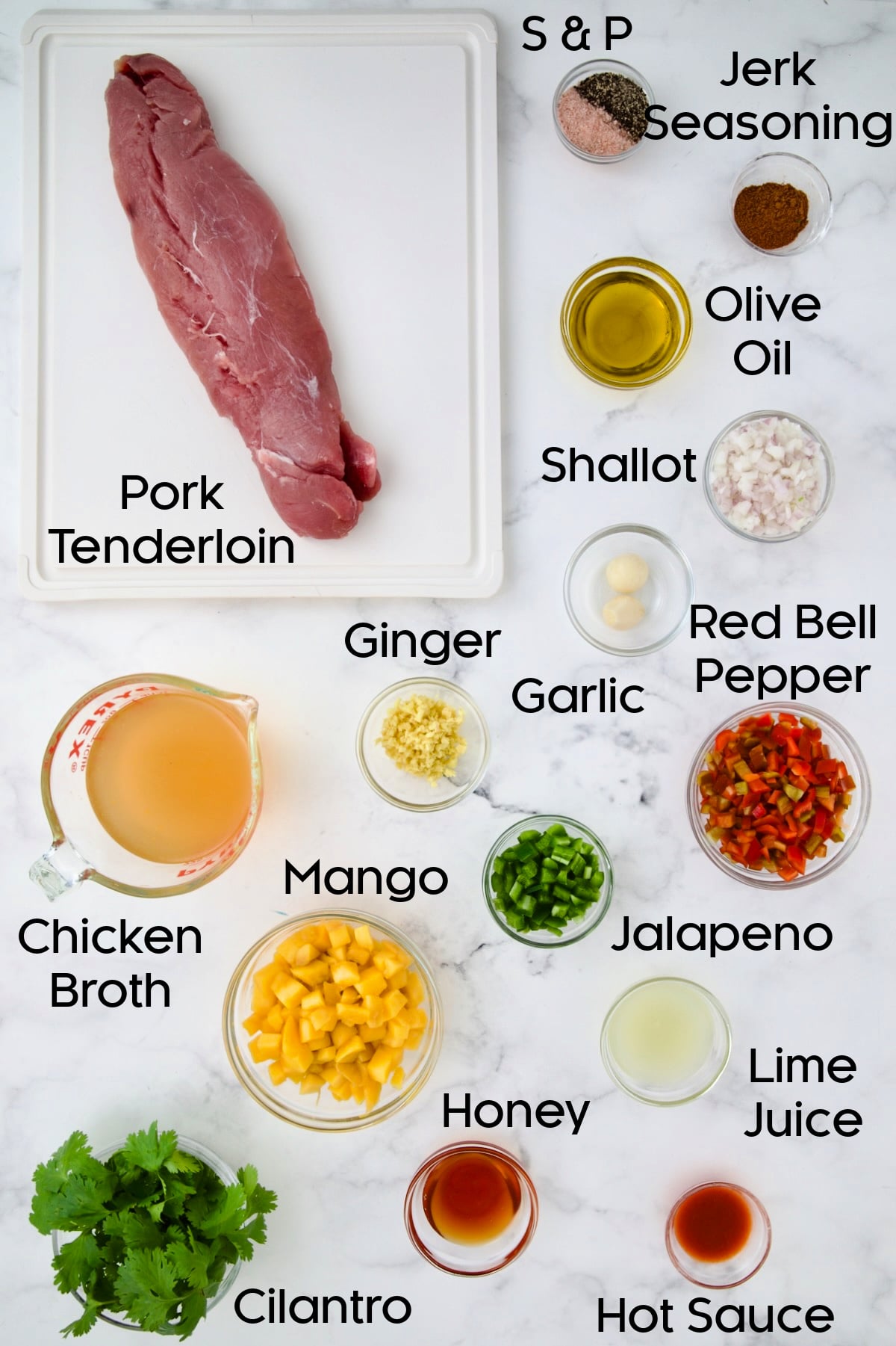 Ingredients for Caribbean Pork Tenderloin in glass bowls.