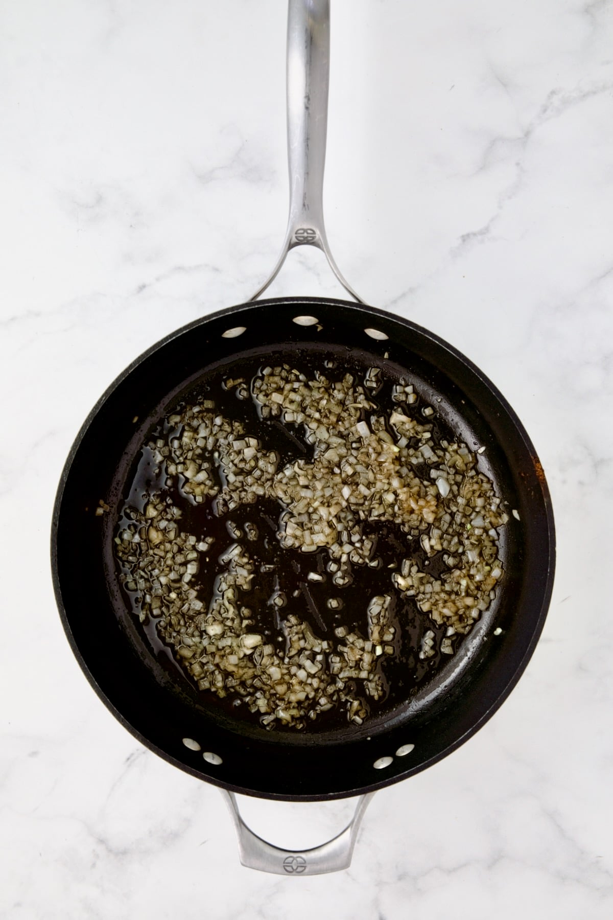 Cooked shallots in nonstick skillet.