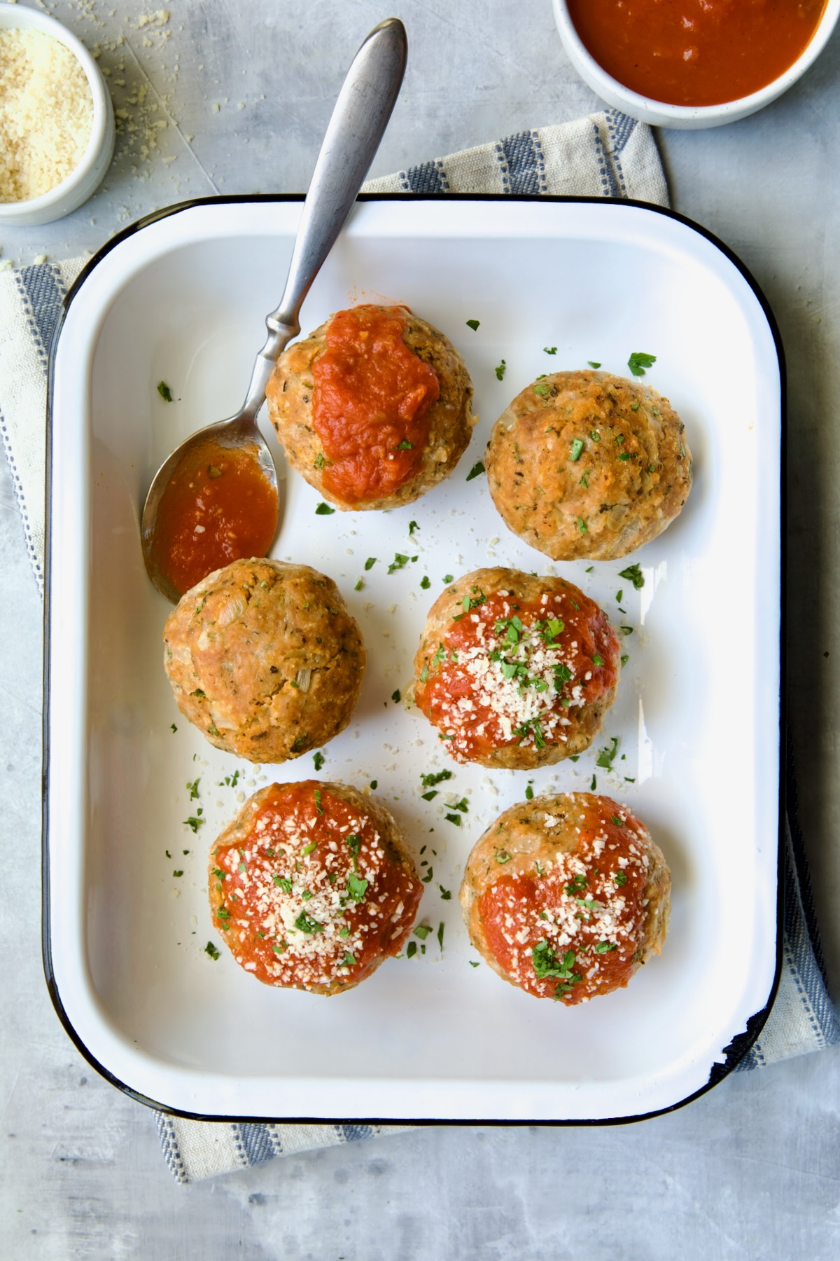 Six Turkey Meatloaf Muffins in white enamel pan.
